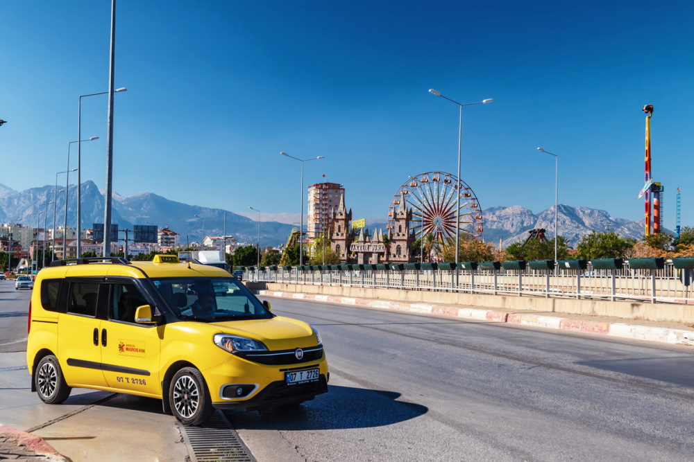 Yellow street taxi in Antalya (Editorial)